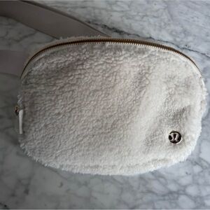 Lululemon cream Sherpa style pouch